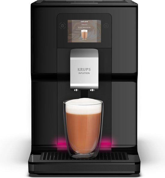 Zwarte Krups Intuition Preference machine met glazen latte macchiato en roze accentverlichting.