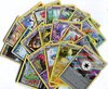 Afbeelding van het spelletje 50 random Pokémon kaarten met een foil kaart