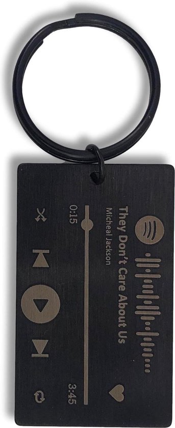 Porte-clés rectangulaire noir avec codage Spotify jouable et "They Don't Care About Us" de Michael Jackson.
