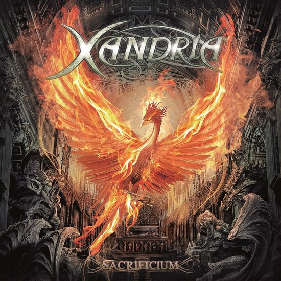 Album cover met Xandria logo en feniks in vlammen, omringd door architectuur en demonische wezens. Tekst: Sacrificium.