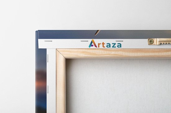 Arrière d'une impression sur toile Artaza avec cadre en bois et système de suspension.