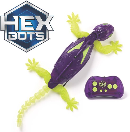 Paarse en groene gekko-robot met afstandsbediening en oplaadkabels, op witte achtergrond. Met HEX BOTS logo.