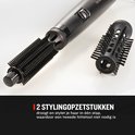 Zwarte Remington föhnborstel met twee opzetstukken: een ronde borstel en een andere ronde borstel met stuggere pinnen.