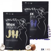 Twee zwarte JHUST Wax Beans verpakkingen, één met gele en één met blauwe waxbonen. Kokosnoten en lavendel takken op de voorgrond. '2X 1 KG' is zichtbaar.