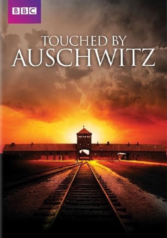 Couverture de livre 'Touched by Auschwitz' avec le titre en gros caractères, coucher de soleil sur un camp avec des voies ferrées.