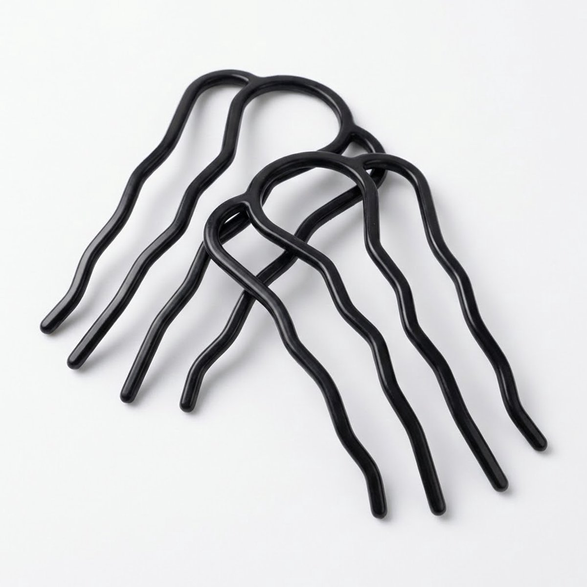 Zwartkleurige haar clip set van 2 stuks dames golvend design haar accessoire minimalistisch model