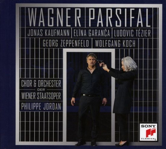 Wagner: Parsifal. Mannen in zwart, vrouw richt pistool op man. Achtergrond met witte lijnen.
