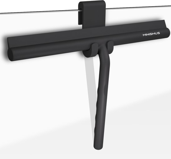 Racloir de douche noir avec une large bande noire, suspendu à un crochet de suspension noir sur une paroi en verre.