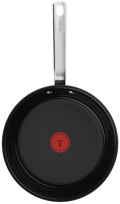 Zwarte Tefal koekenpan met zilverkleurig handvat en rode indicator op de bodem.
