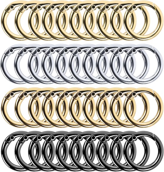 Veertig ronde, metalen karabijnsluitingen in goud, zilver en zwart.