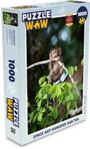 Puzzel Jonge aap hangend aan tak - Legpuzzel - Puzzel 1000 stukjes volwassenen