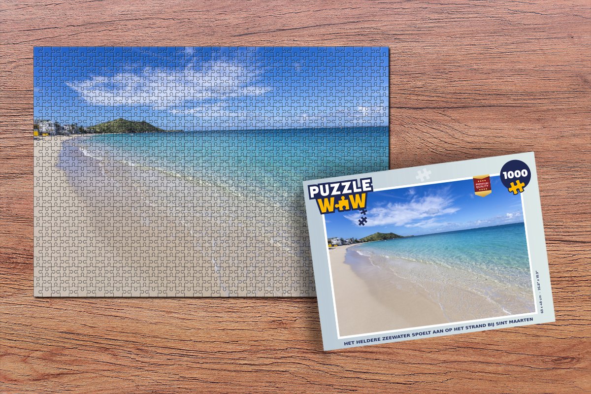 Puzzel Het heldere zeewater spoelt aan op het strand bij Sint Maarten