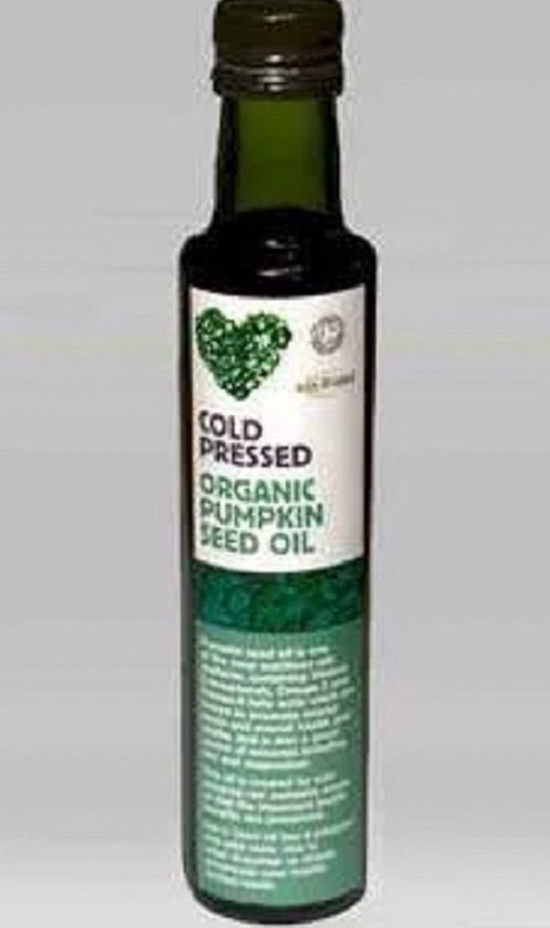 Groene fles biologische pompoenpitolie. Koudgeperst.