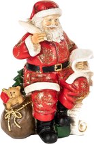Zittende Kerstman met ganzenveer en cadeau zak van het merk Goodwill - Kerstmanfiguur 13 cm