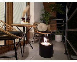 Luxe bio-ethanol sfeerhaard in Moon Mini Zwart – geschikt voor binnen- en buitengebruik – rookvrij en stijlvol design.