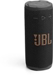 Zwarte JBL draagbare speaker met oranje JBL logo en grijze knoppen bovenop.