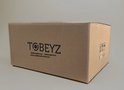 Bruine kartonnen Tobeyz verpakking met logo, 'Opbergdozen - Opbergboxen - Verschillende kleuren'.
