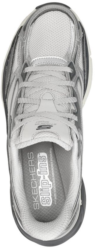 Zilverkleurige Skechers instappers met veters en 'Slip-ins' logo.