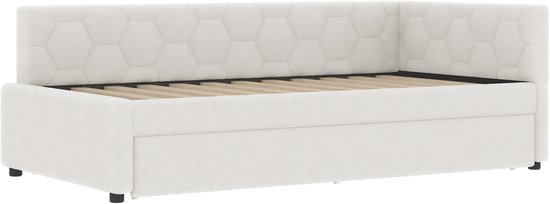 Witte slaapbank met zeshoekig gestoffeerde rugleuning, zonder bed.
