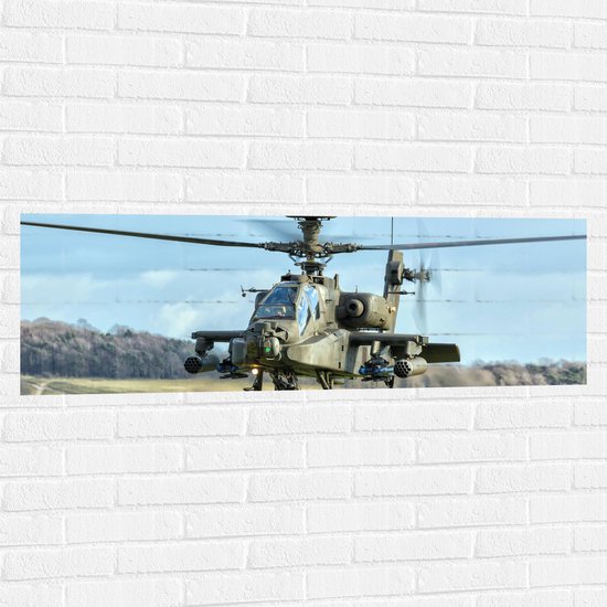 WallClassics - Muursticker - Legerhelikopter boven Groen Landschap - 120x40 cm Foto op Muursticker
