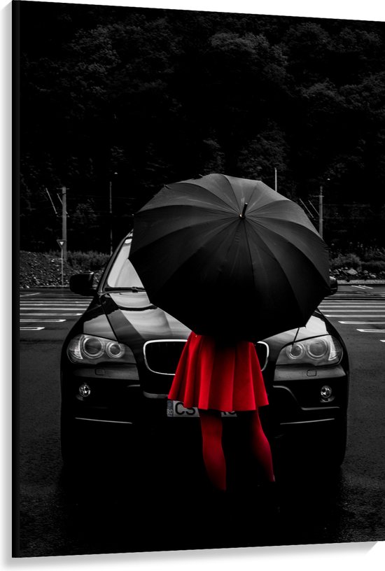 WallClassics - Toile - Femme en rouge dans une voiture noire avec parapluie - 100x150 cm Photo sur toile (Décoration murale sur toile)