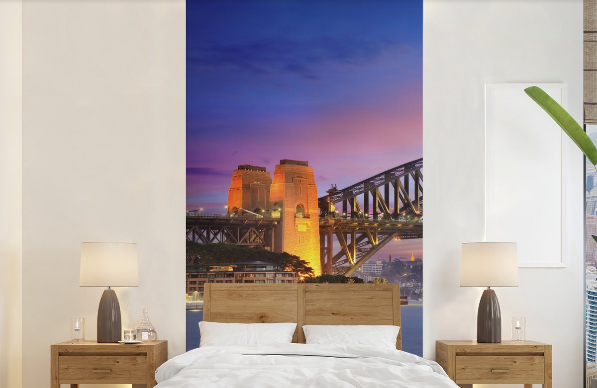Behang - Fotobehang Skyline van Sydney en de Sydney Harbour Bridge in Australië - Breedte 120 cm x hoogte 240 cm