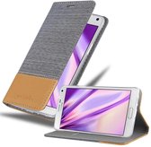 Cadorabo Hoesje voor Samsung Galaxy NOTE 4 in LICHTGRIJS BRUIN - Beschermhoes met magnetische sluiting, standfunctie en kaartvakje Book Case Cover Etui