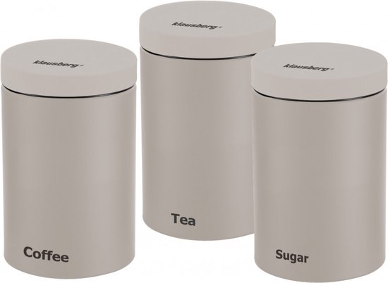 Set van drie beige voorraadbussen met deksel, met opschriften 'Coffee', 'Tea' en 'Sugar'.