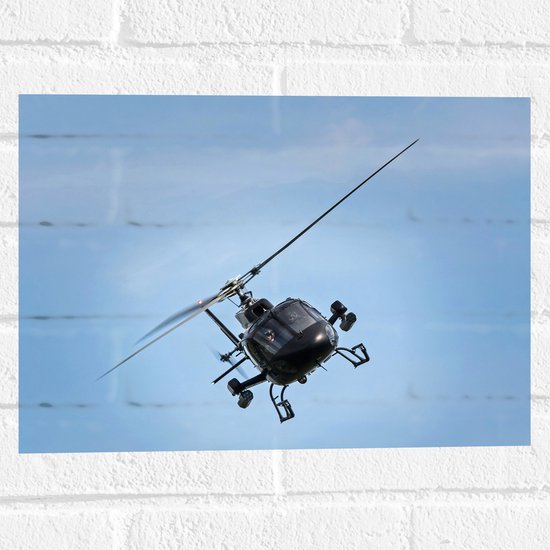 WallClassics - Muursticker - Hélicoptère noir dans un ciel bleu - Photo 40x30 cm sur Muursticker