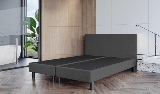 Boxspring Fleur in antraciet stof, 180x200 cm, met twee aparte onderstellen en een hoofdbord.