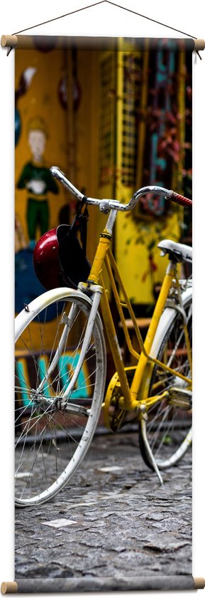 WallClassics - Textielposter - Gele Fiets in de Stad - 40x120 cm Foto op Textiel