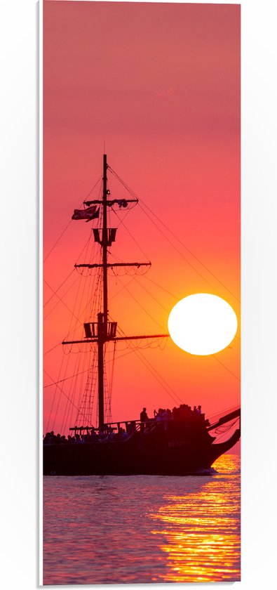 WallClassics - PVC Schuimplaat- Silhouet van Groot Vrachtschip tijdens Rozekleurige Zonsondergang - 20x60 cm Foto op PVC Schuimplaat