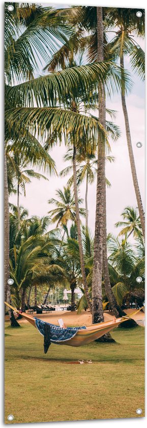 Tuinposter – Hangmat tussen Palmbomen - 50x150 cm Foto op Tuinposter (wanddecoratie voor buiten en binnen)
