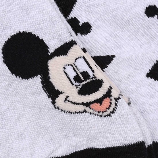 Grijze sok met een patroon van Mickey Mouse gezichten.