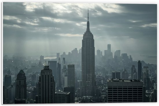 PVC Schuimplaat- Felle Zonnestralen op Wolkenkrabbers van New York - 60x40 cm Foto op PVC Schuimplaat