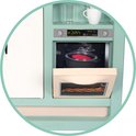 Close-up van de Smoby speelkeuken met digitale timer op 2:25 C, een open oven met broodjes, en een gesloten oven met burger.