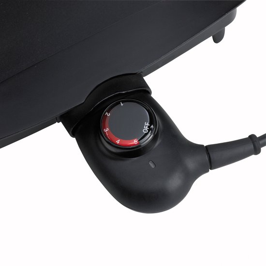 Close-up van de zwarte temperatuurregelaar van de Tefal grillplaat.
