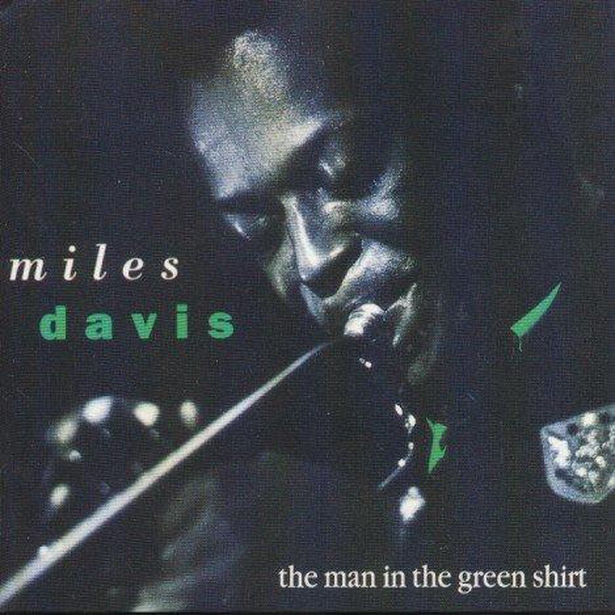The man in the green shirt