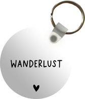 Sleutelhanger - Engelse quote Wanderlust met een hartje op een witte achtergrond - Plastic - Rond - Uitdeelcadeautjes