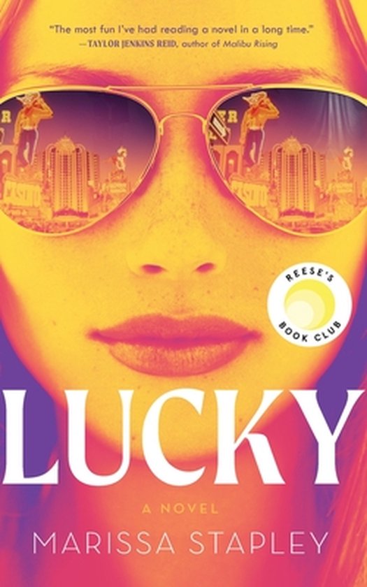 Couverture du livre 'Lucky' avec un gros plan sur un visage et des reflets de Las Vegas dans les lunettes de soleil.