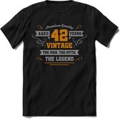 42 Jaar Legend T-Shirt | Goud - Zilver | Grappig Verjaardag Cadeau | Dames - Heren | - Zwart - M