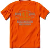 41 Jaar Legend T-Shirt | Goud - Zilver | Grappig Verjaardag Cadeau | Dames - Heren | - Oranje - M