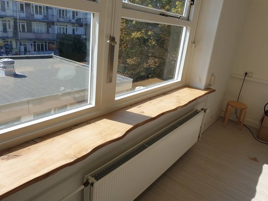 Foto: 25 mm eiken houten vensterbank onbehandeld golvend roar 30 cm diep x 100 cm lang wandplank colibri ptmd plank planken