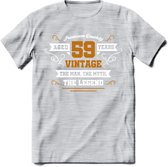 59 Jaar Legend T-Shirt | Goud - Wit | Grappig Verjaardag en Feest Cadeau Shirt | Dames - Heren - Unisex | Tshirt Kleding Kado | - Licht Grijs - Gemaleerd - S