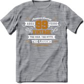 99 Jaar Legend T-Shirt | Goud - Wit | Grappig Verjaardag en Feest Cadeau Shirt | Dames - Heren - Unisex | Tshirt Kleding Kado | - Donker Grijs - Gemaleerd - XL