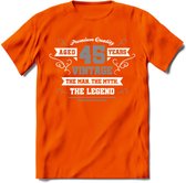 45 Jaar Legend T-Shirt | Zilver - Wit | Grappig Verjaardag en Feest Cadeau | Dames - Heren - Unisex | Kleding Kado | - Oranje - M