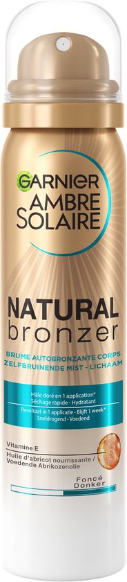 Garnier Ambre Solaire Natural Bronzer zelfbruinende mist in gouden spuitbus met vitamine E en abrikozenolie.