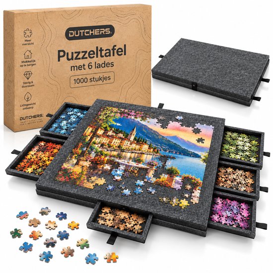 Puzzeltafel met 6 uitschuifbare lades voor 1000 stukjes, getoond met een voltooid puzzellandschap aan een meer.