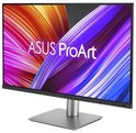 ASUS ProArt monitor in schuine hoek, toont kleurrijk display en slanke zilveren voet.