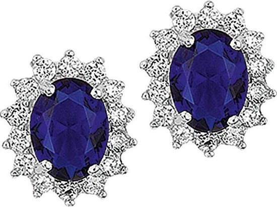 Paar zilveren oorbellen met een blauwe zirkonia en diamantjes.